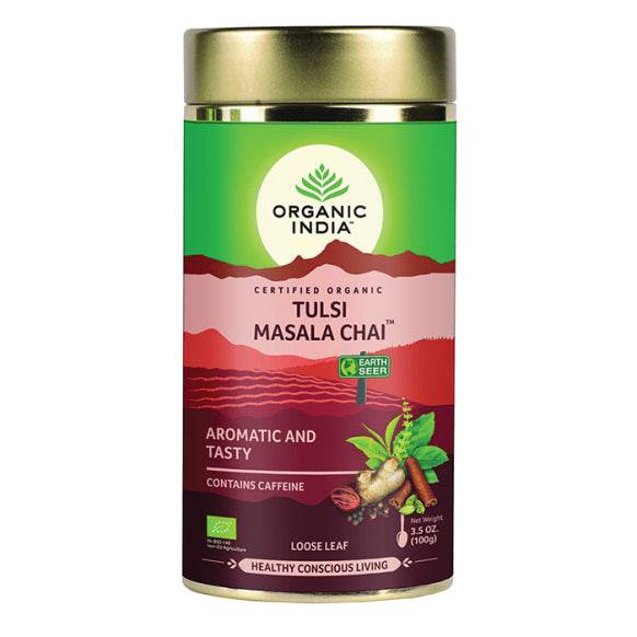 Organic India BIO Tulsi Masala loose leaf tea in a 100g tin, green and black tea blend with herbs, shown in a tin container.