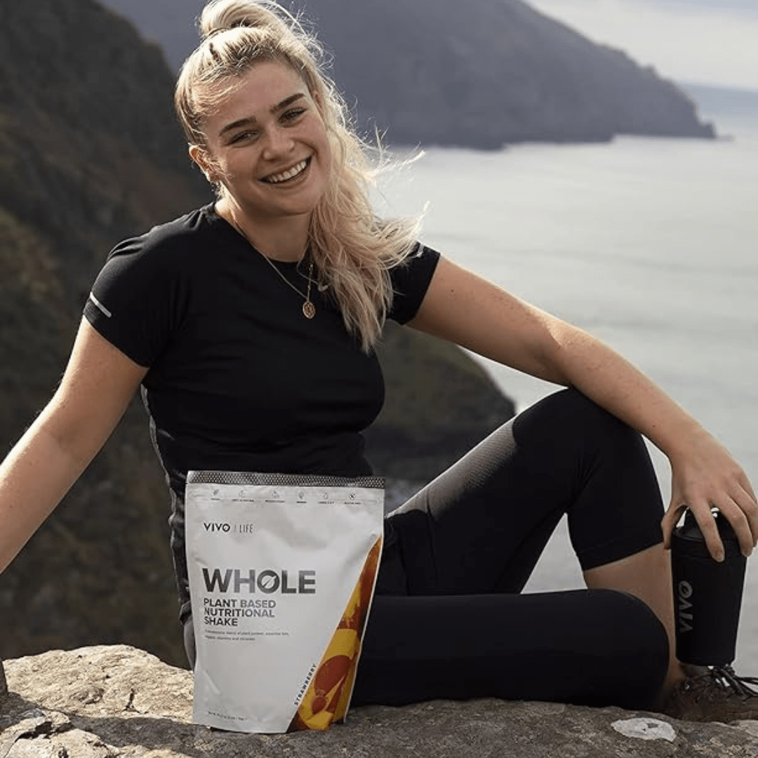 Vivo Life Whole Plant-Based Nutritional Shake supplement with natural ingredients in a colorful container.