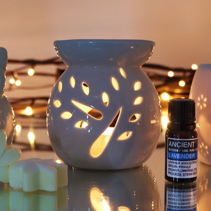 Large white oil burner with tree cut-out design, classic style, by AW GIFTS, used for aromatherapy and essential oils.