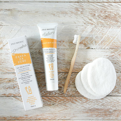 ZEO-MEDIC natural toothpaste with zeolite, xylitol, orange, menthol, and mint flavor for fresh oral hygiene.