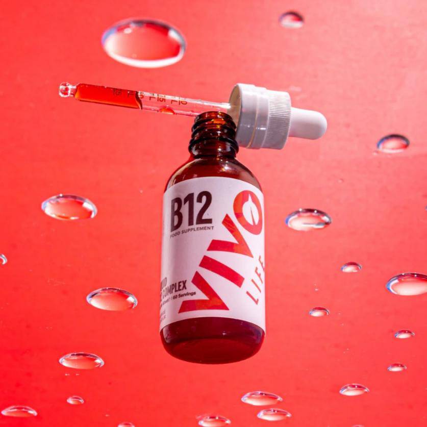 Vivo Life B12 High Potency Vegan Vitamin Blend supplement bottle with vibrant label and capsules visible.