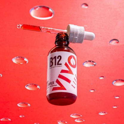 Vivo Life B12 High Potency Vegan Vitamin Blend supplement bottle with vibrant label and capsules visible.