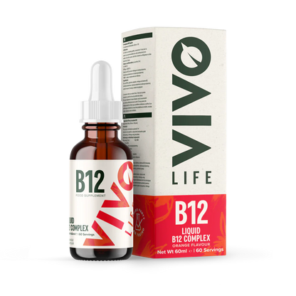Vivo Life B12 high potency vegan vitamin supplement bottle with a green label and white cap on a wooden surface.