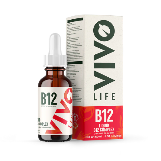 Vivo Life B12 high potency vegan vitamin supplement bottle with a green label and white cap on a wooden surface.