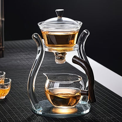 Borosilicate glass gongfu tea set with lazy-style teapot and suction brewing system, designed for premium tea preparation.
