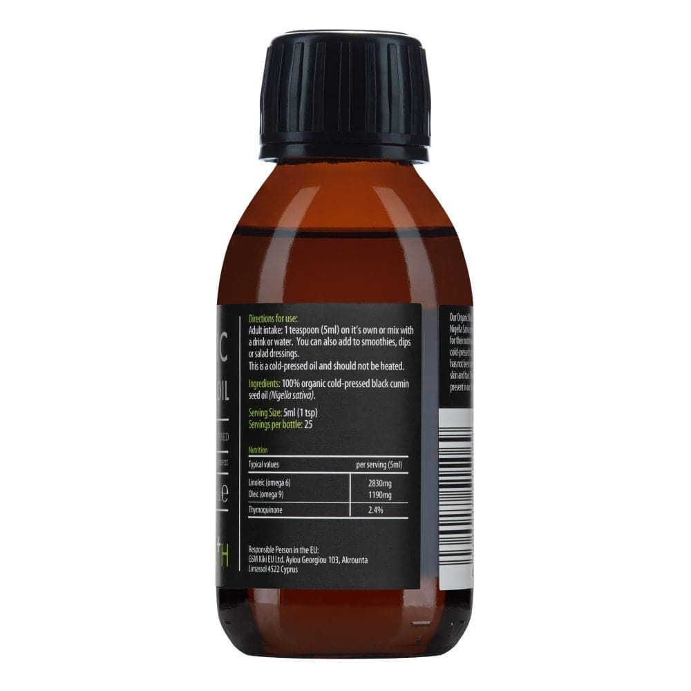 Dark glass bottle of Kiki Health Organic Black Seed Oil supplement by Herbalistas, 125ml, with a label featuring black seeds and green accents.
