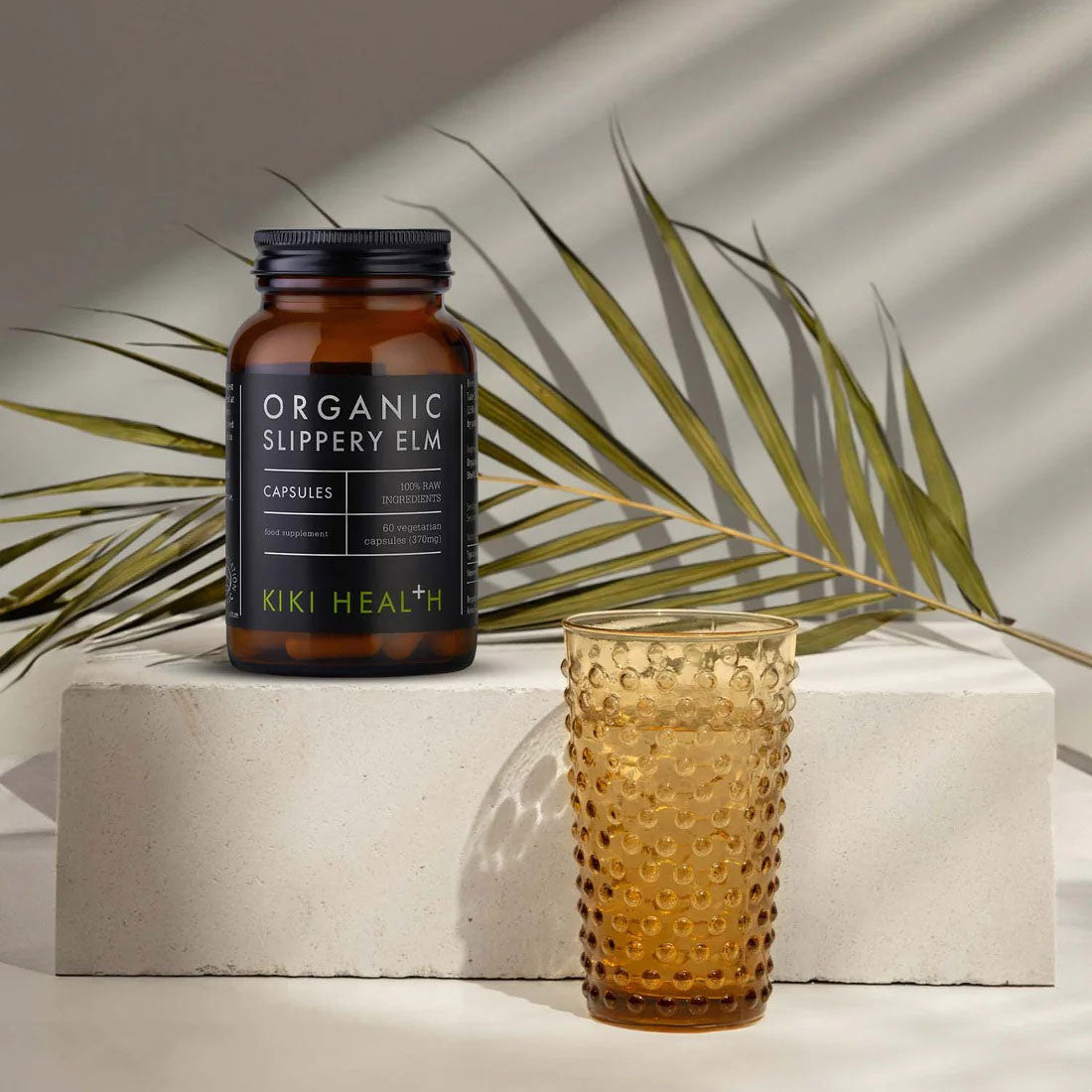 Organic Slippery Elm supplement by Herbalistas in 60 veggie capsules, showing the capsules inside a clear container.