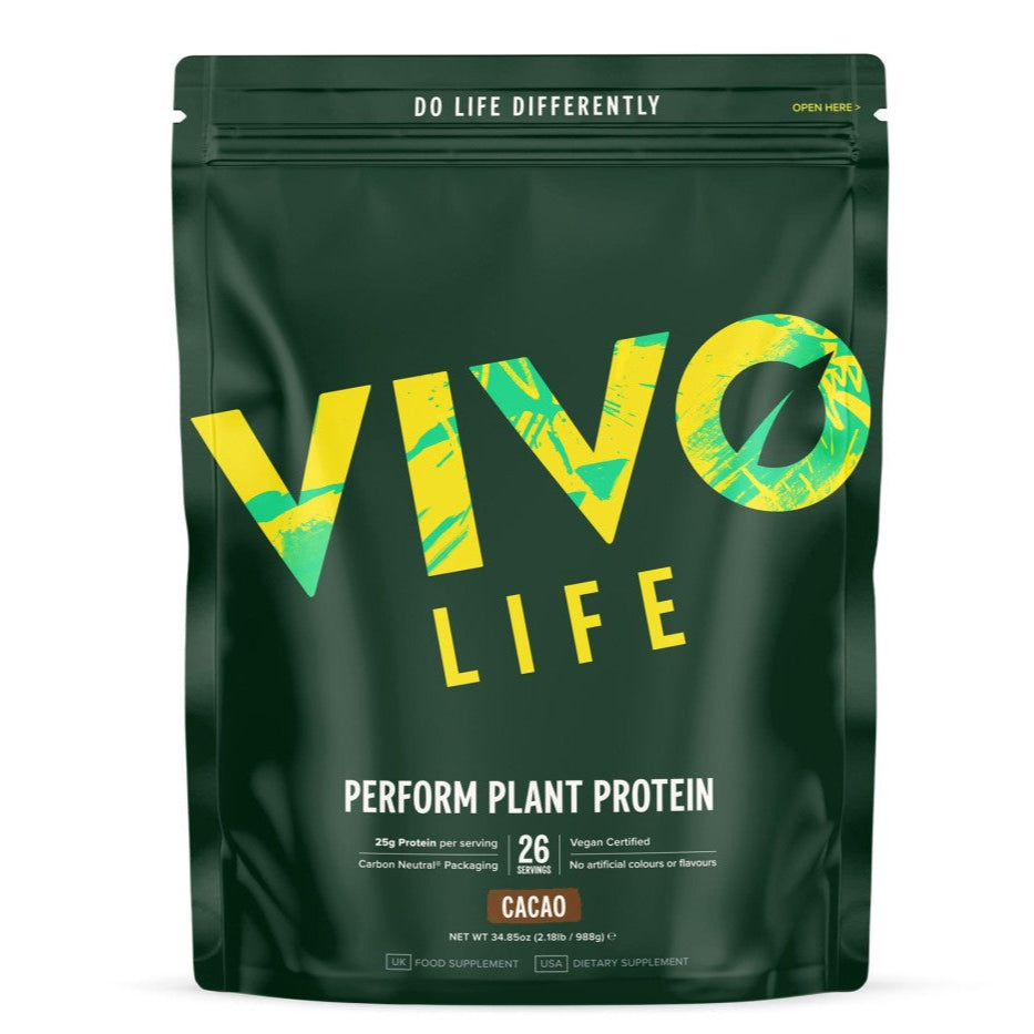 Large Vivo Life PERFORM Raw Plant Protein & BCAA protein powder jar with cacao cru flavor, featuring a label and scoop inside.